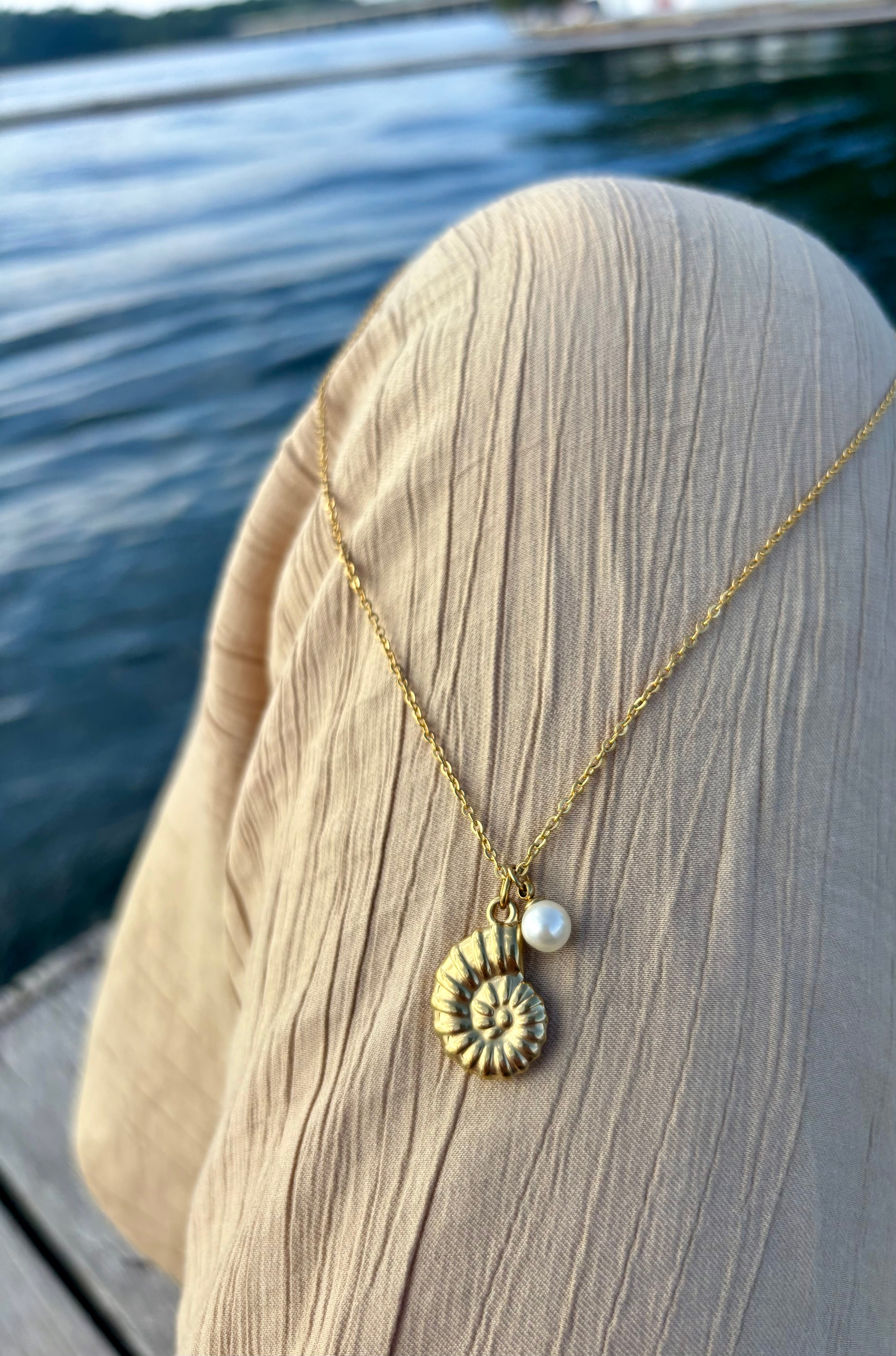 nautilus pearl charm necklace