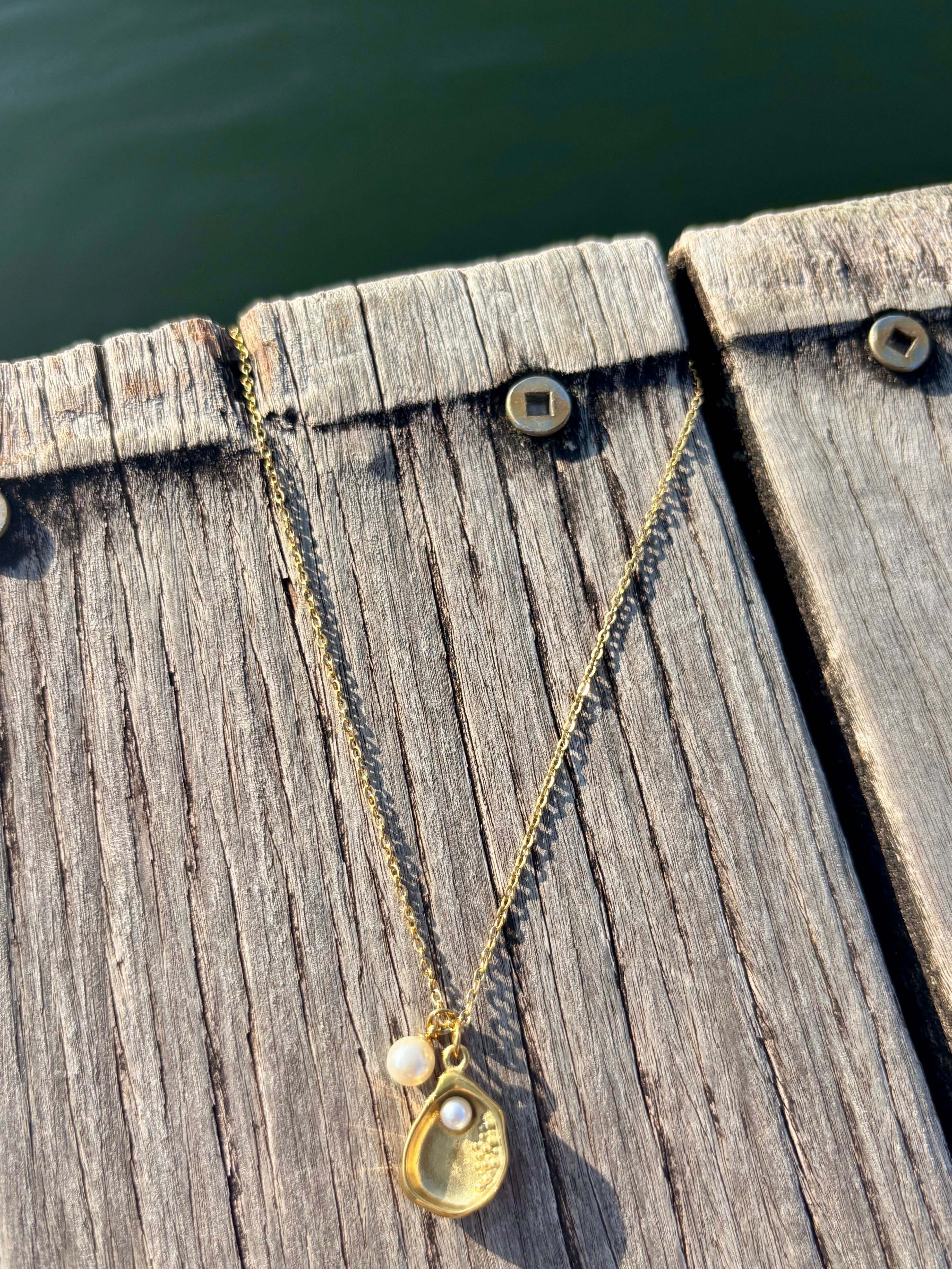 oyster shell and pearl necklace
