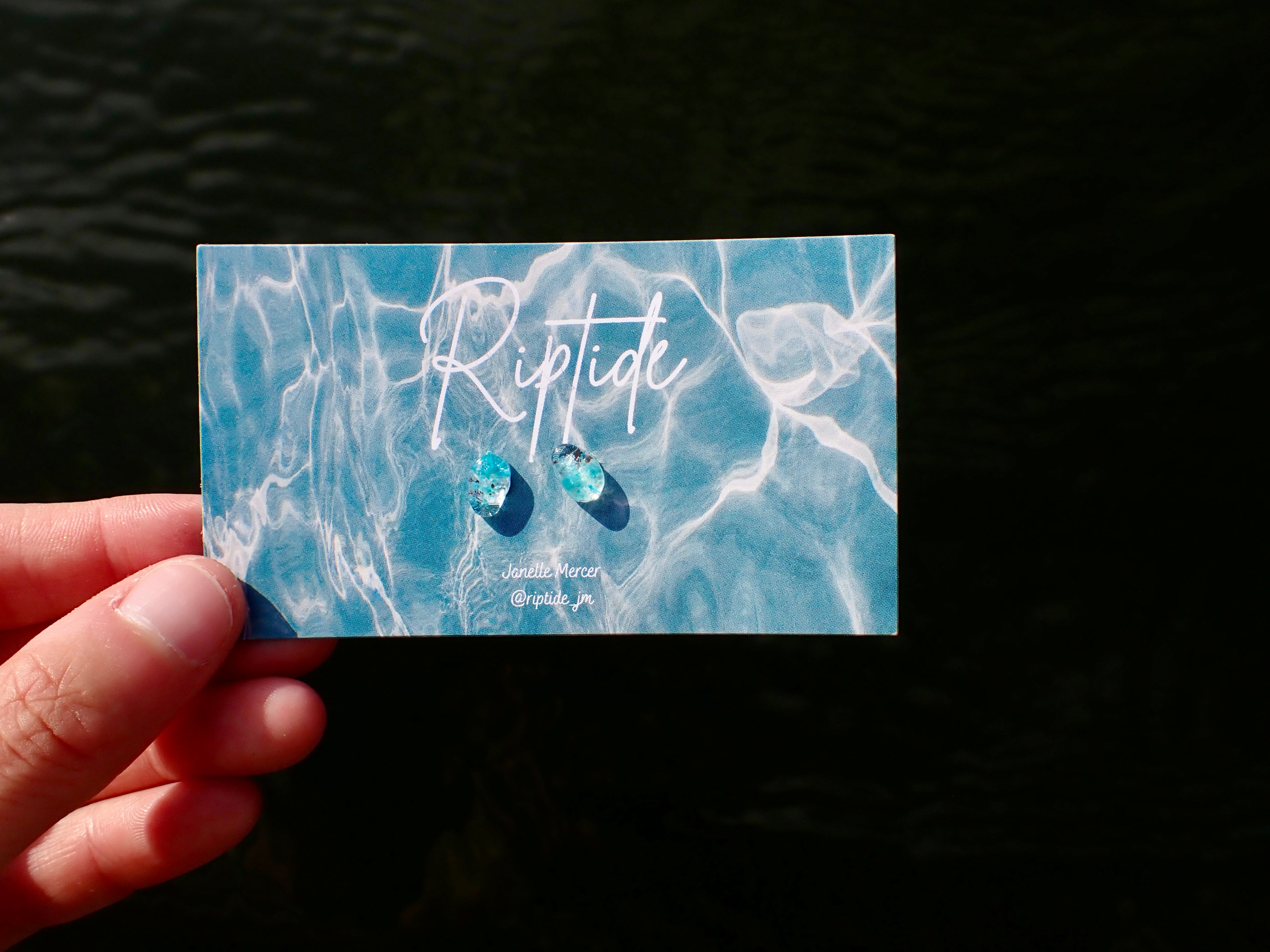 blue teardrop microplastic earrings