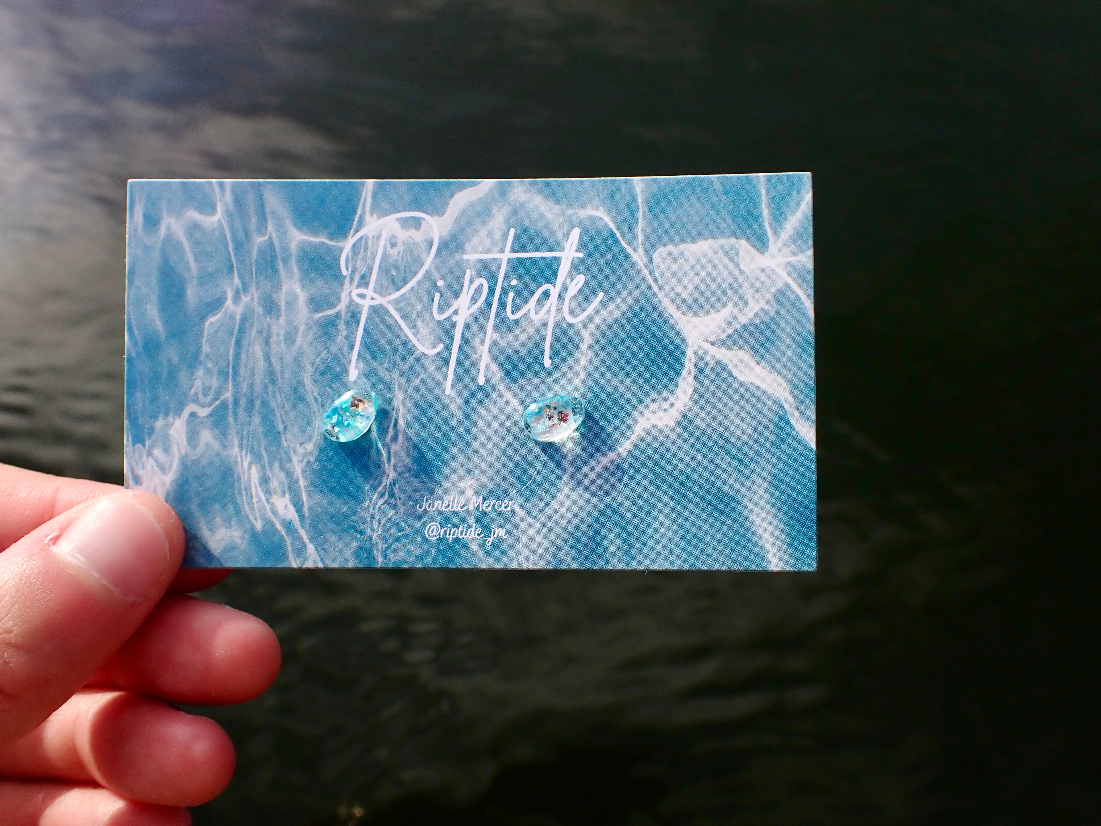 blue teardrop microplastic earrings