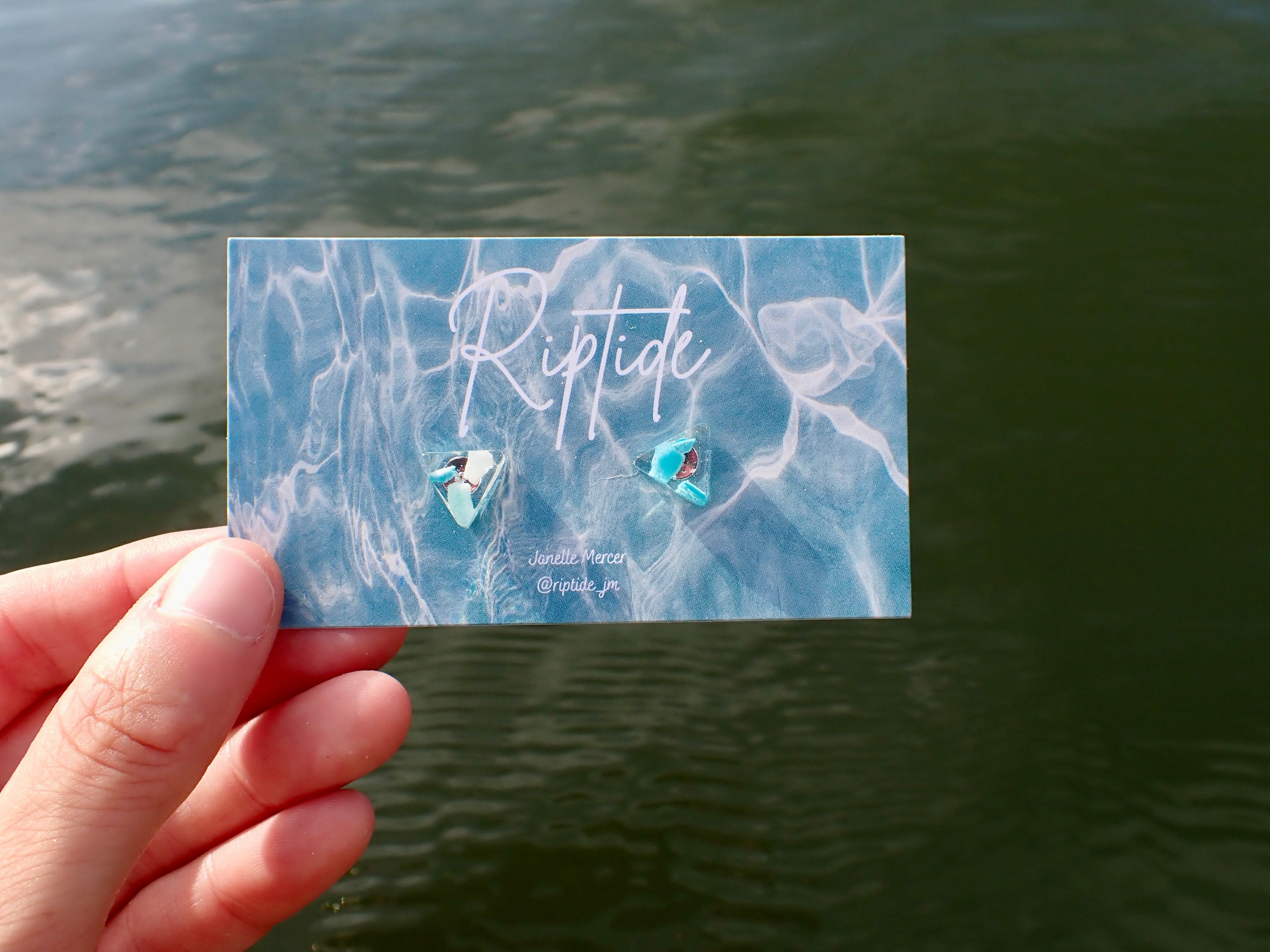 blue triangle microplastic earrings