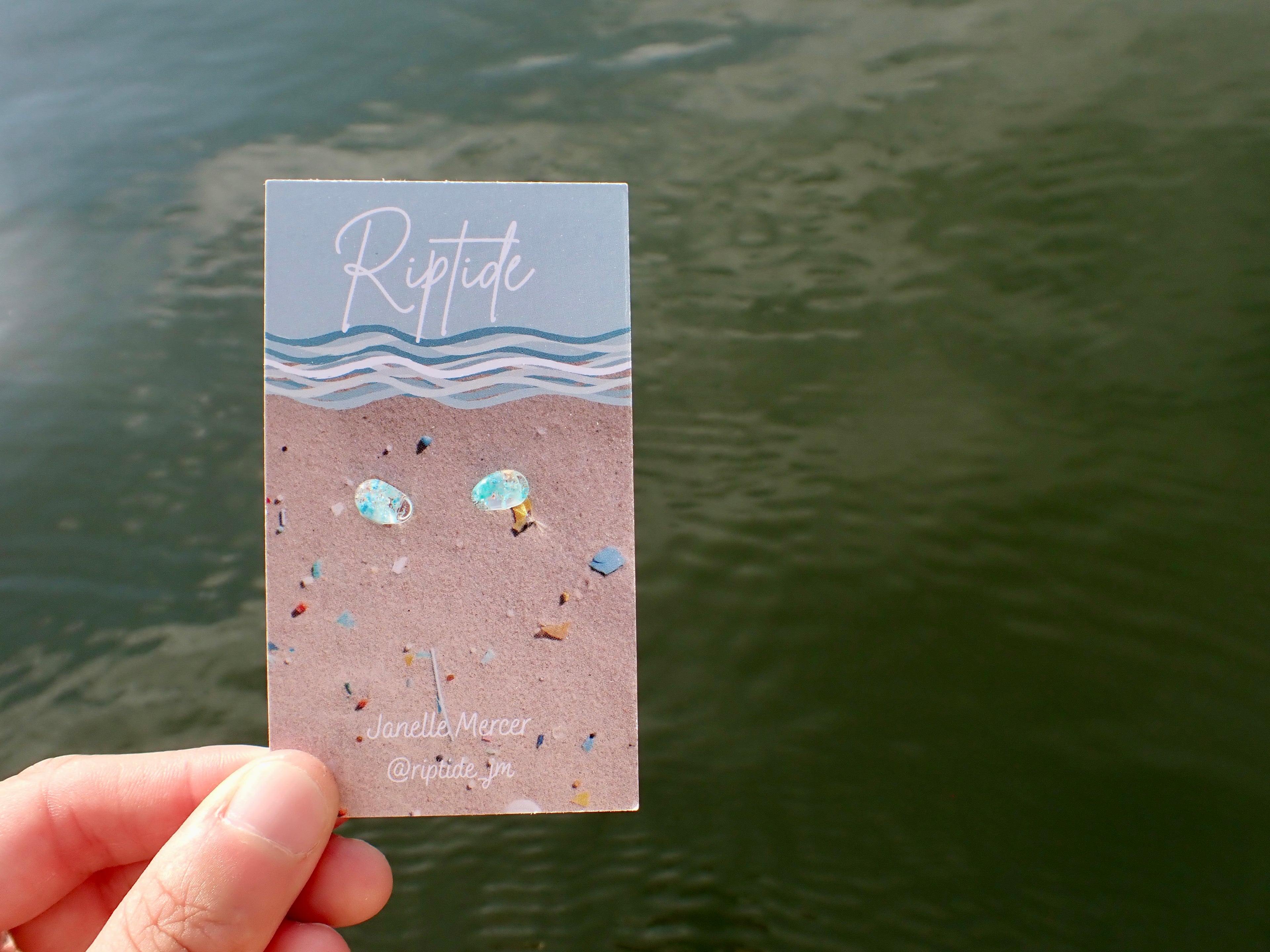 blue teardrop microplastic earrings
