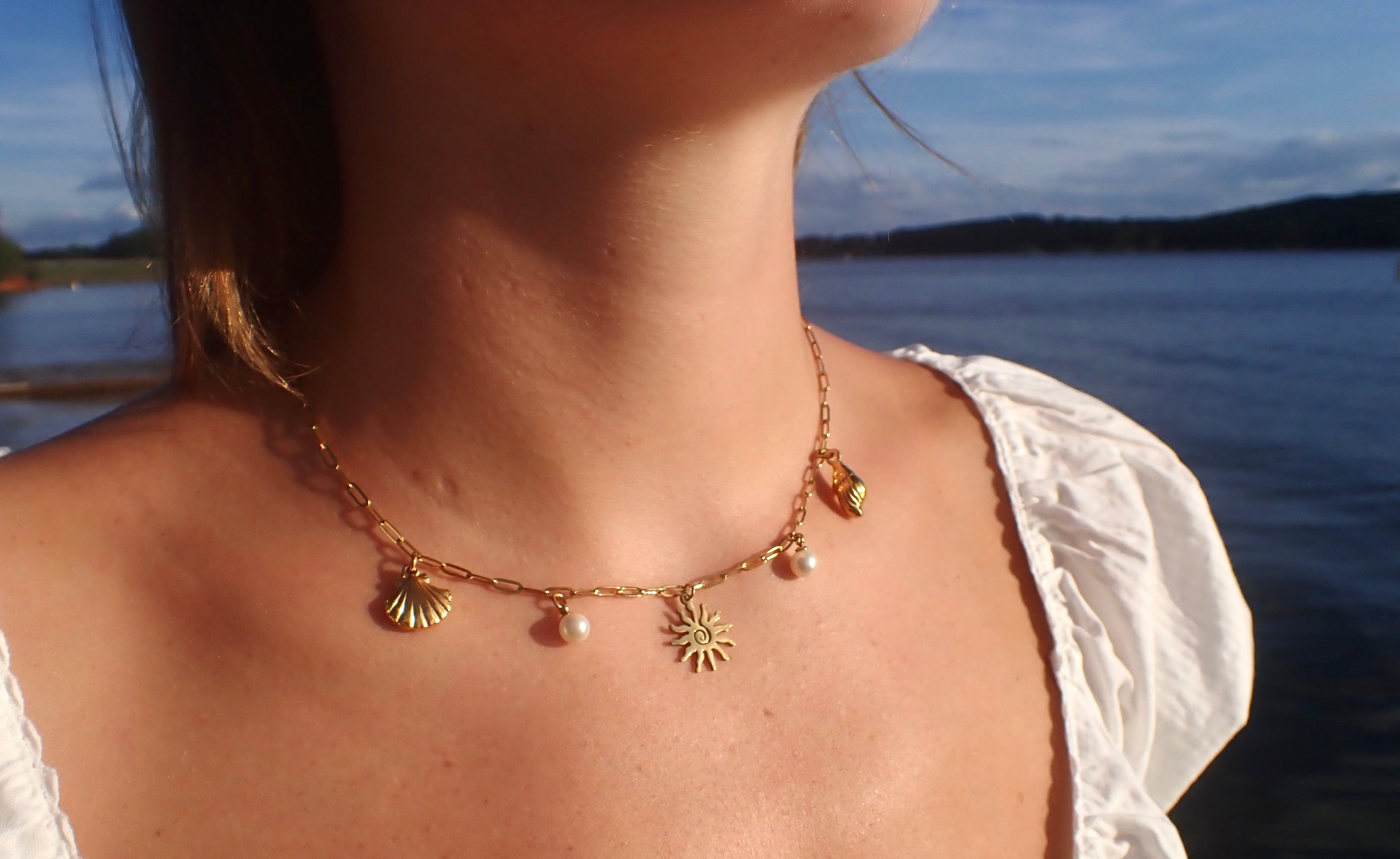 16in paperclip chain with sun charm