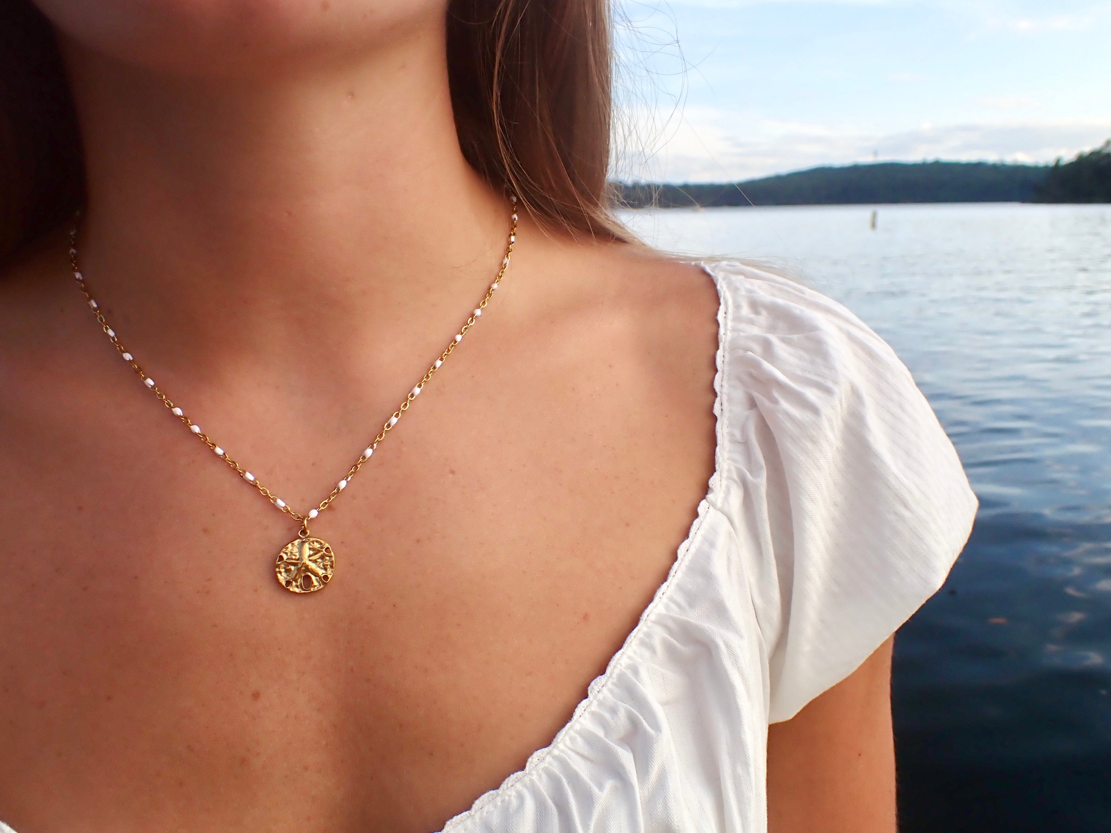 16 in white confetti with sand dollar charm